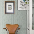 Arne Jacobsen Tassel graafinen vaaleanvihrea tapetti olohuoneeseen Borastapeter