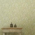 Ritva Kronlundin Niittyleinikki vihrea kukkatapetti olohuoneeseen Pihlgren ja Ritolalta 69199