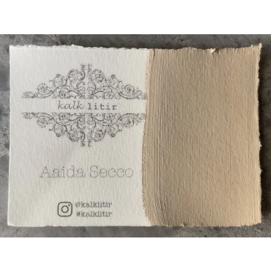 Aaida Secco beige kalkkimaali joka taittuu keltaiseen Kalklitir image