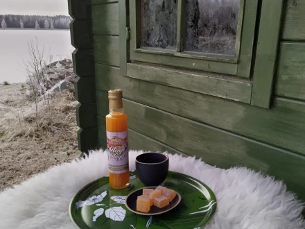 Julpaket från Österbotten – skogsgrön Österbottenbricka med sällskap